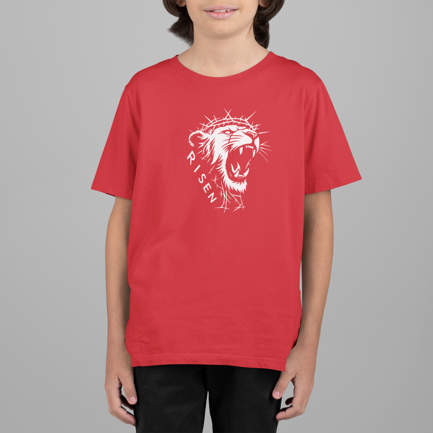 Youth The Risen King - Christian T-Shirt featuring a roaring lion graphic in white on a red tee.