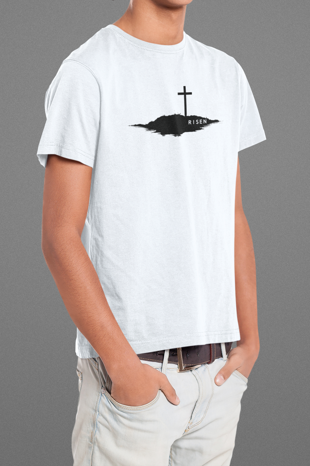 Youth Unmoved Christian T-Shirt featuring RISEN cross graphic on a lightweight jersey fabric.