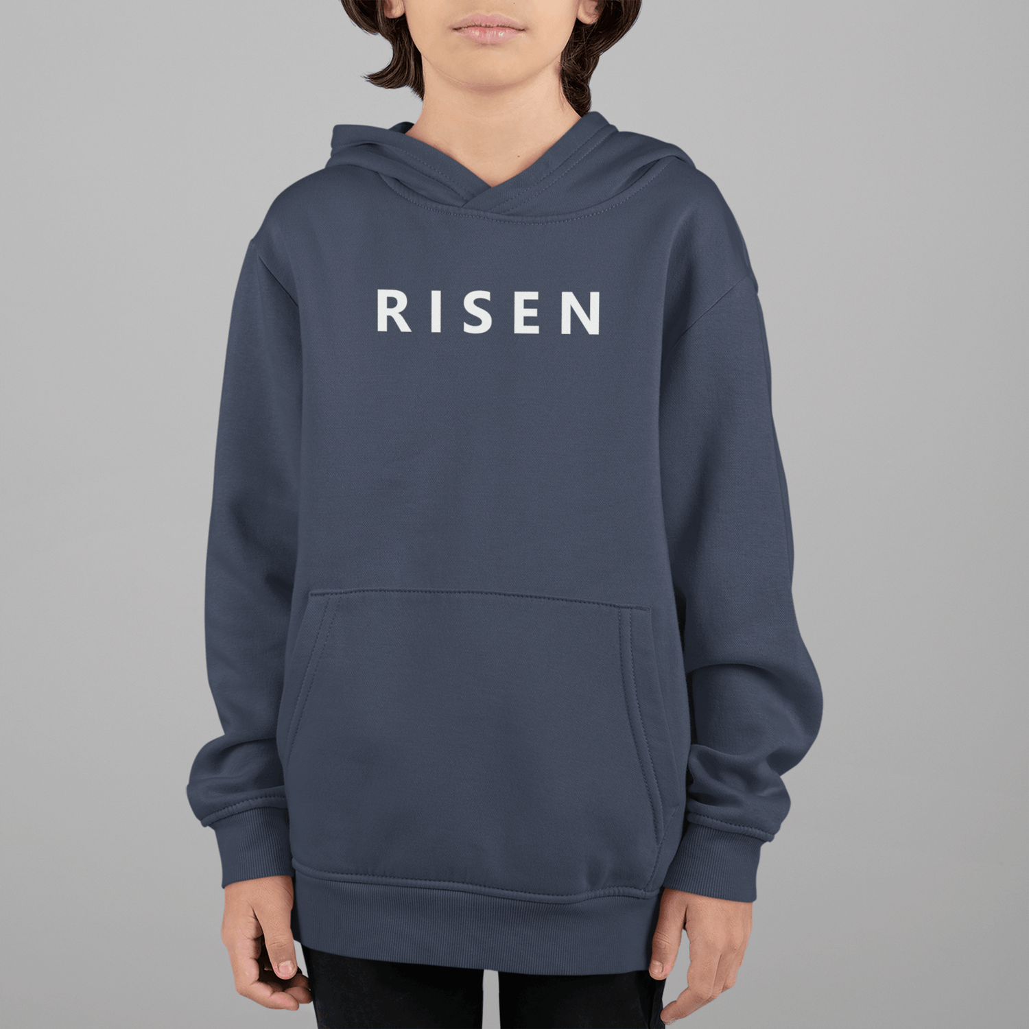Youth Christian Hoodies in navy blue with RISEN printed on front, designed for strength and everyday confidence.