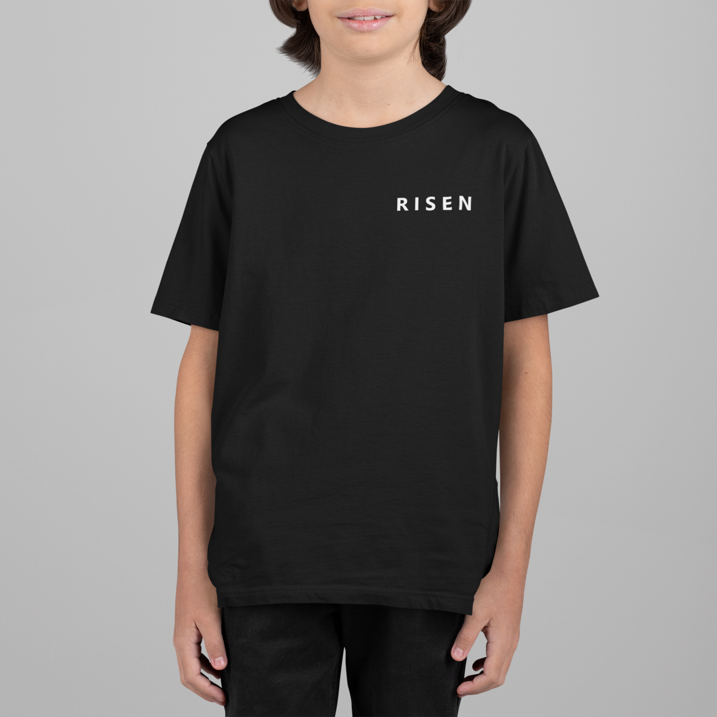 Born to Rise Youth Christian T-Shirt featuring RISEN graphic design for young believers.