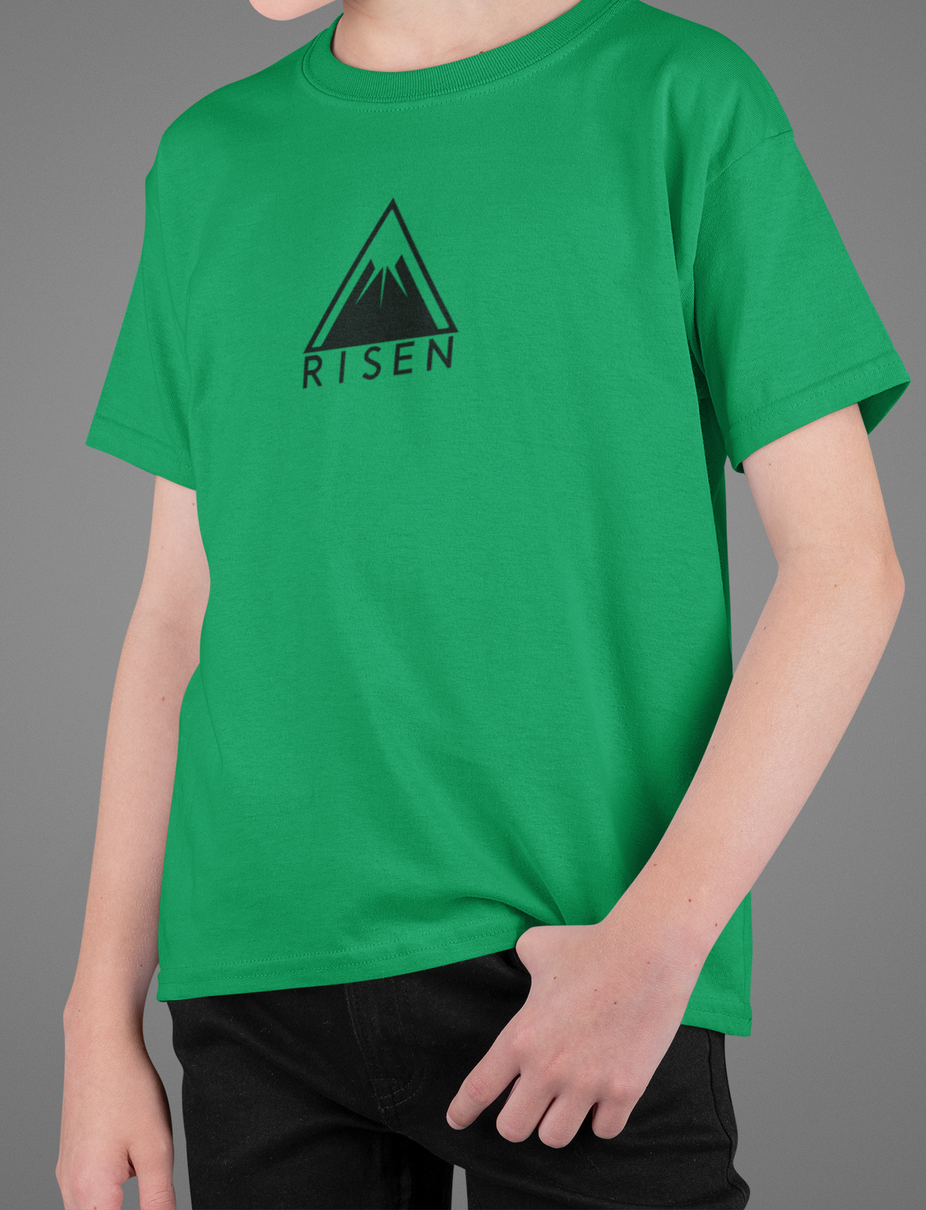 Youth The Peak Christian T-Shirt in green with RISEN mountain graphic emblem on front.
