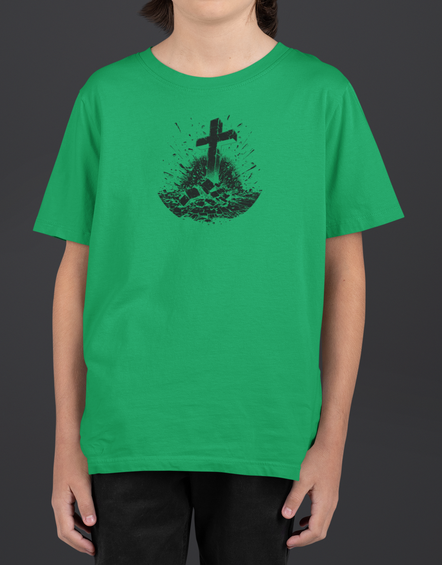 Youth Breakthrough Christian T-Shirt featuring RISEN cross graphic on a green tee.