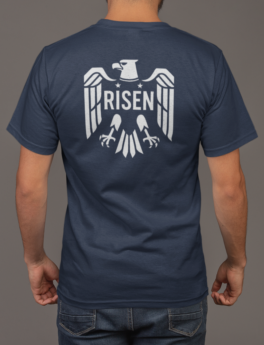 Risen Eagle Men’s T-Shirt featuring a bold eagle graphic with RISEN text on the back, perfect for everyday wear.