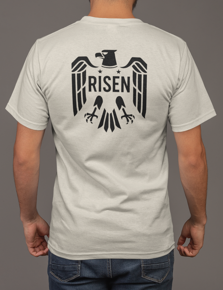 Risen Eagle Men’s T-Shirt featuring a large back graphic of an eagle with RISEN text, perfect for bold style and comfort.