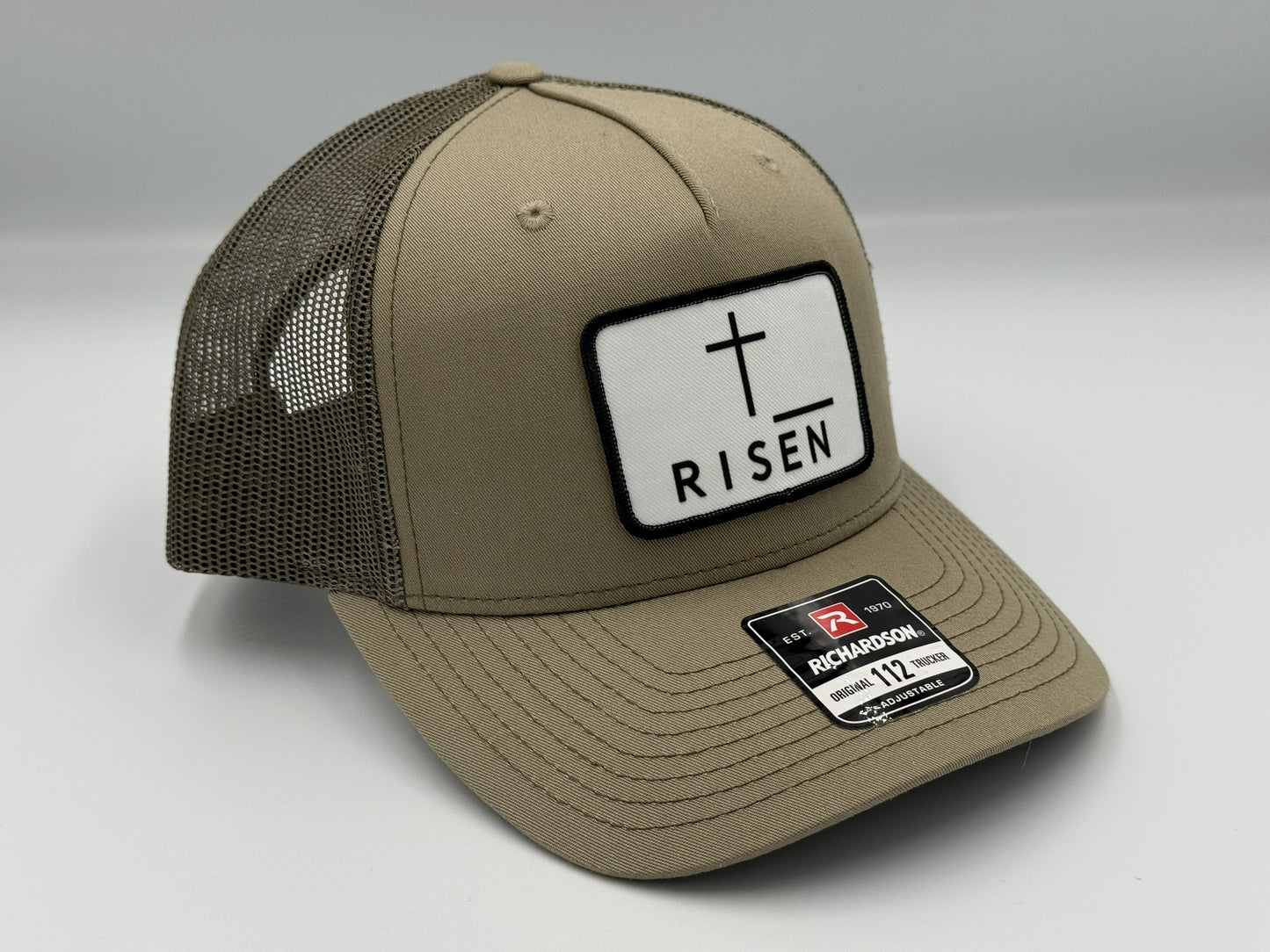 White Risen Cross Canvas Patch – Olive Green Trucker Hat