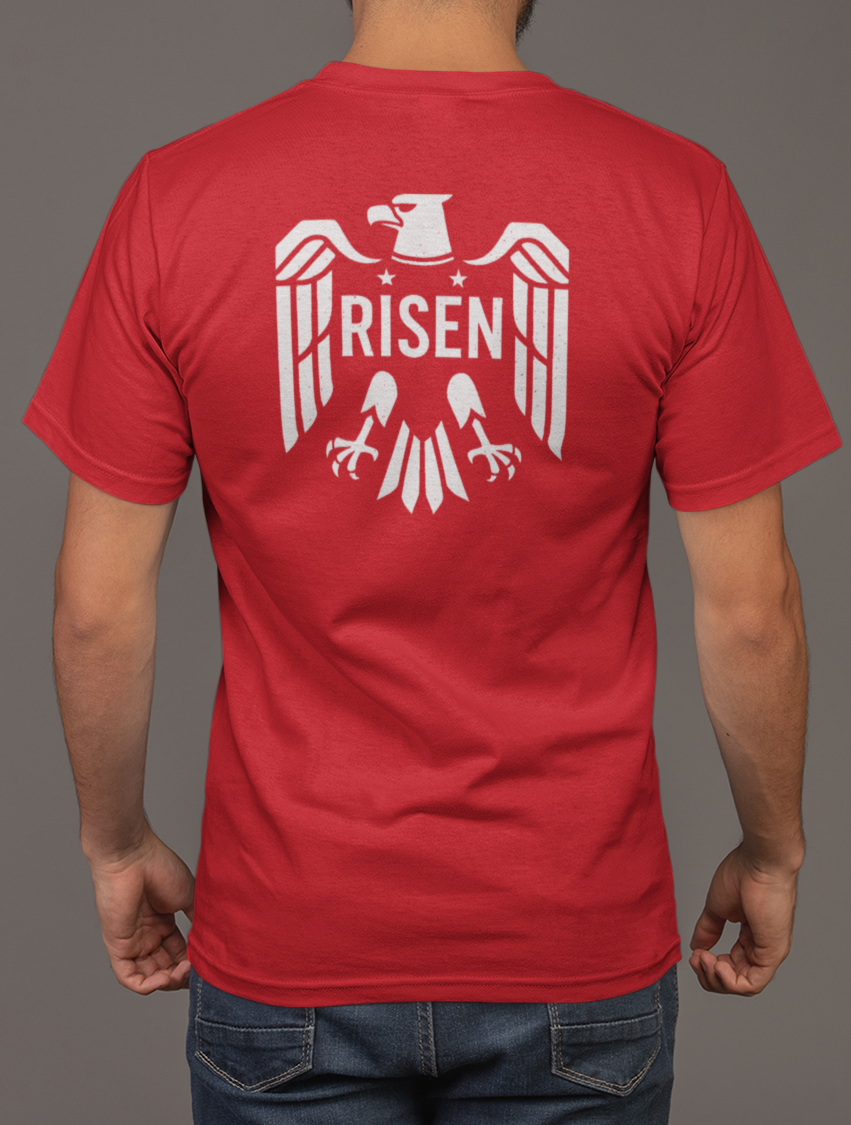 Risen Eagle Men’s T-Shirt back view showcasing eagle graphic and RISEN text in white on red fabric.