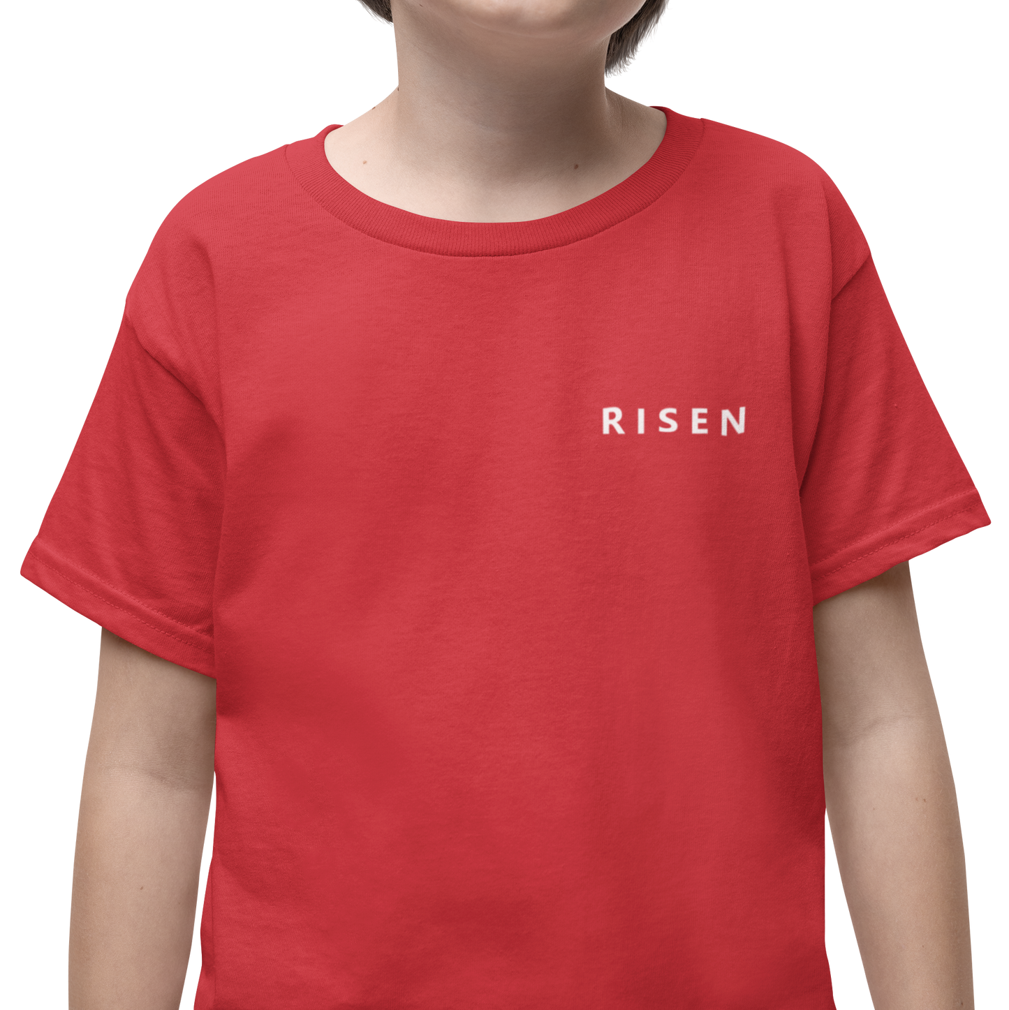 Youth Lion Crest Christian T-Shirt featuring bold 'RISEN' text on a red tee, symbolizing faith and strength.