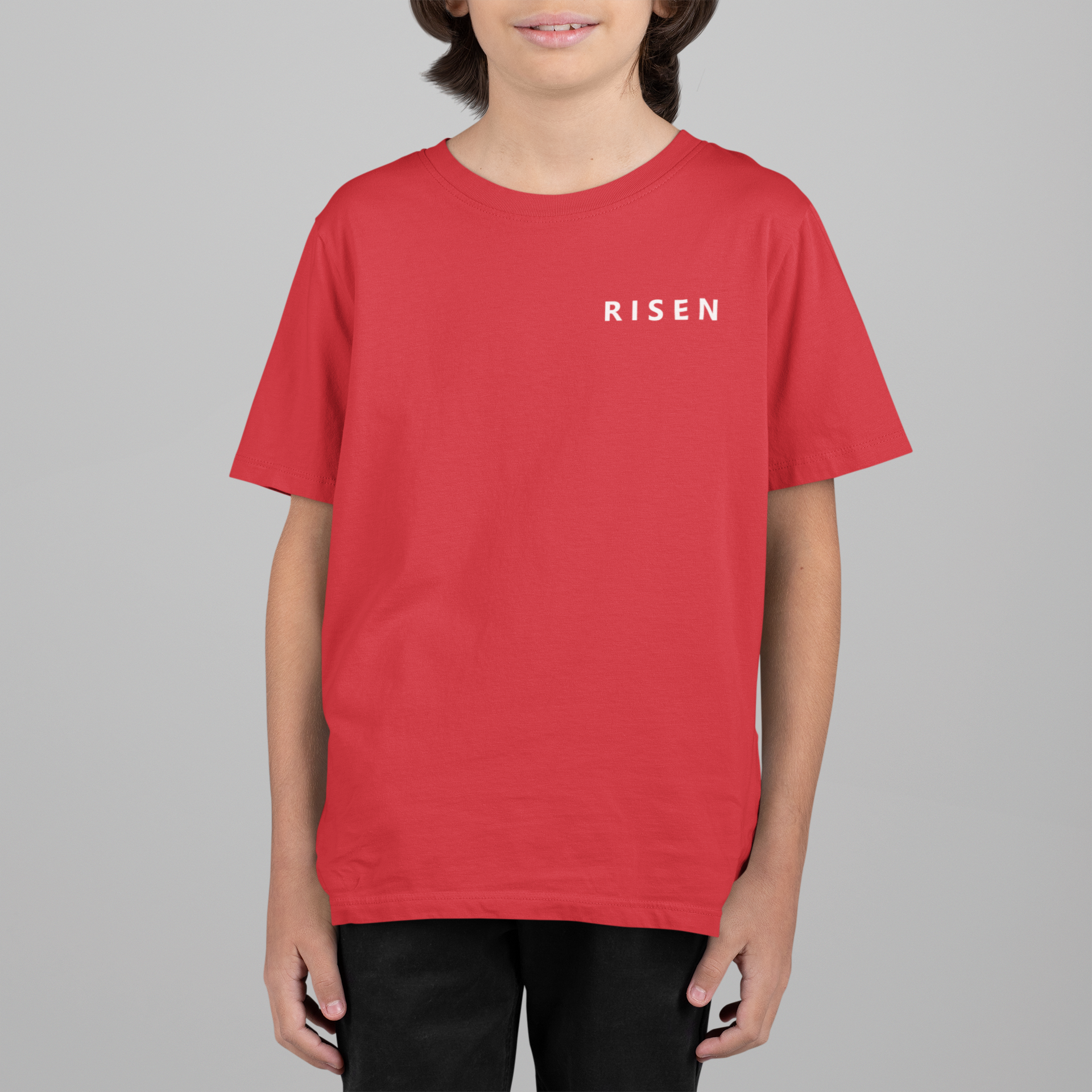 Born to Rise Youth Christian T-Shirt in red featuring RISEN text, perfect for young believers.