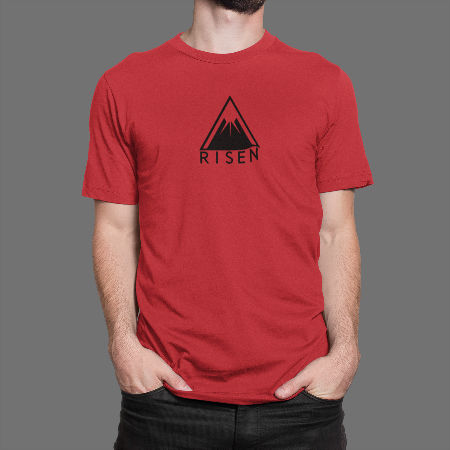 The Peak Men’s Christian T-Shirt in red featuring RISEN mountain graphic design, perfect for aiming higher.