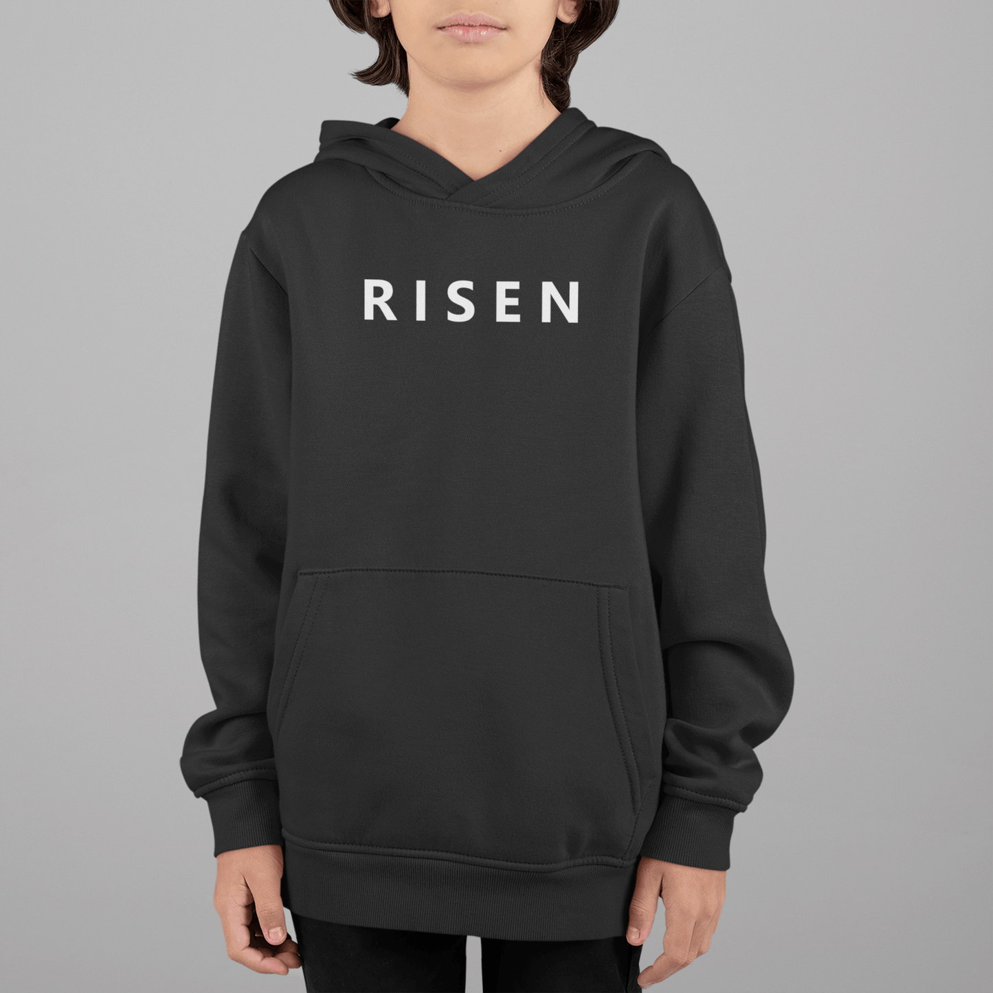Youth fleece pullover hoodie in black featuring Risen logo on front, perfect for casual wear.