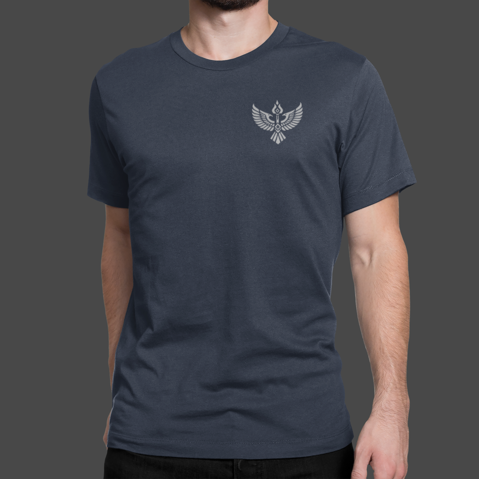 Iron Covenant - Premium Sueded Men's Shirt displayed on a model wearing a navy blue t-shirt with a winged crest design.